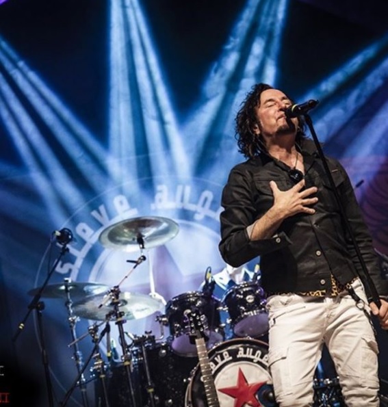 Steve Augeri on stage.